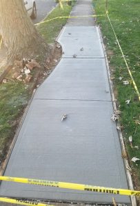 repaired concrete sidewalk