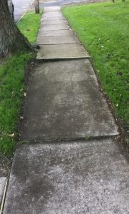 broken concrete sidewalk
